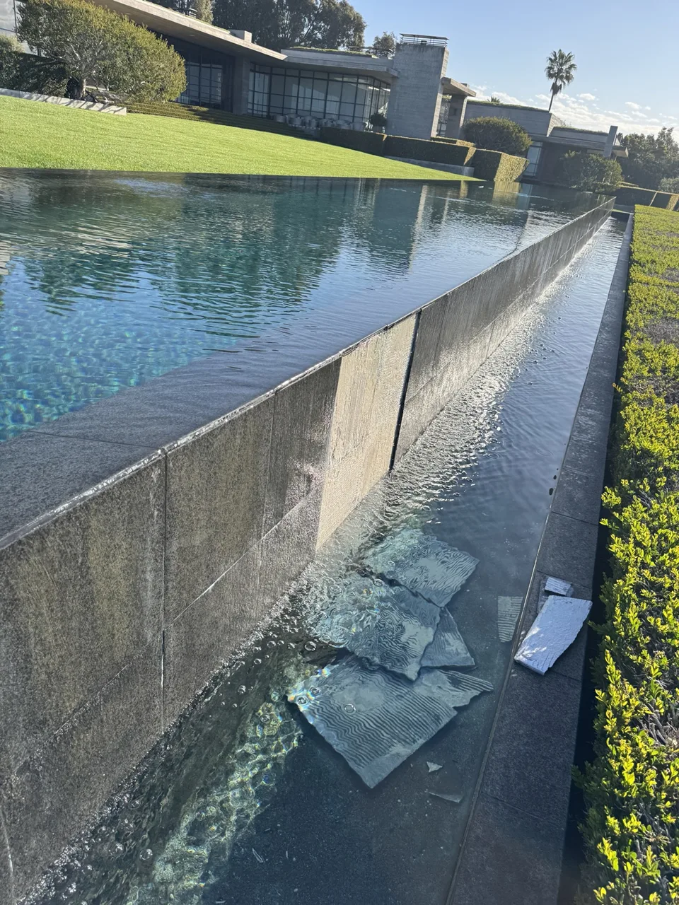 Infinity-edge pool above a narrow catch basin